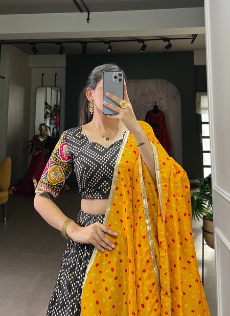 Black Colour Tussar Silk Bandhej And Patola Print With Foil Work Lehenga With Blouse Dupatta Wholesale Market In Surat